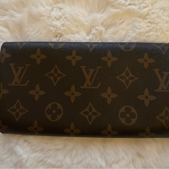 LOUIS VUITTON VINTAGE LEATHER MONOGRAM WALLET
100% Authentic - Picture 3 of 4